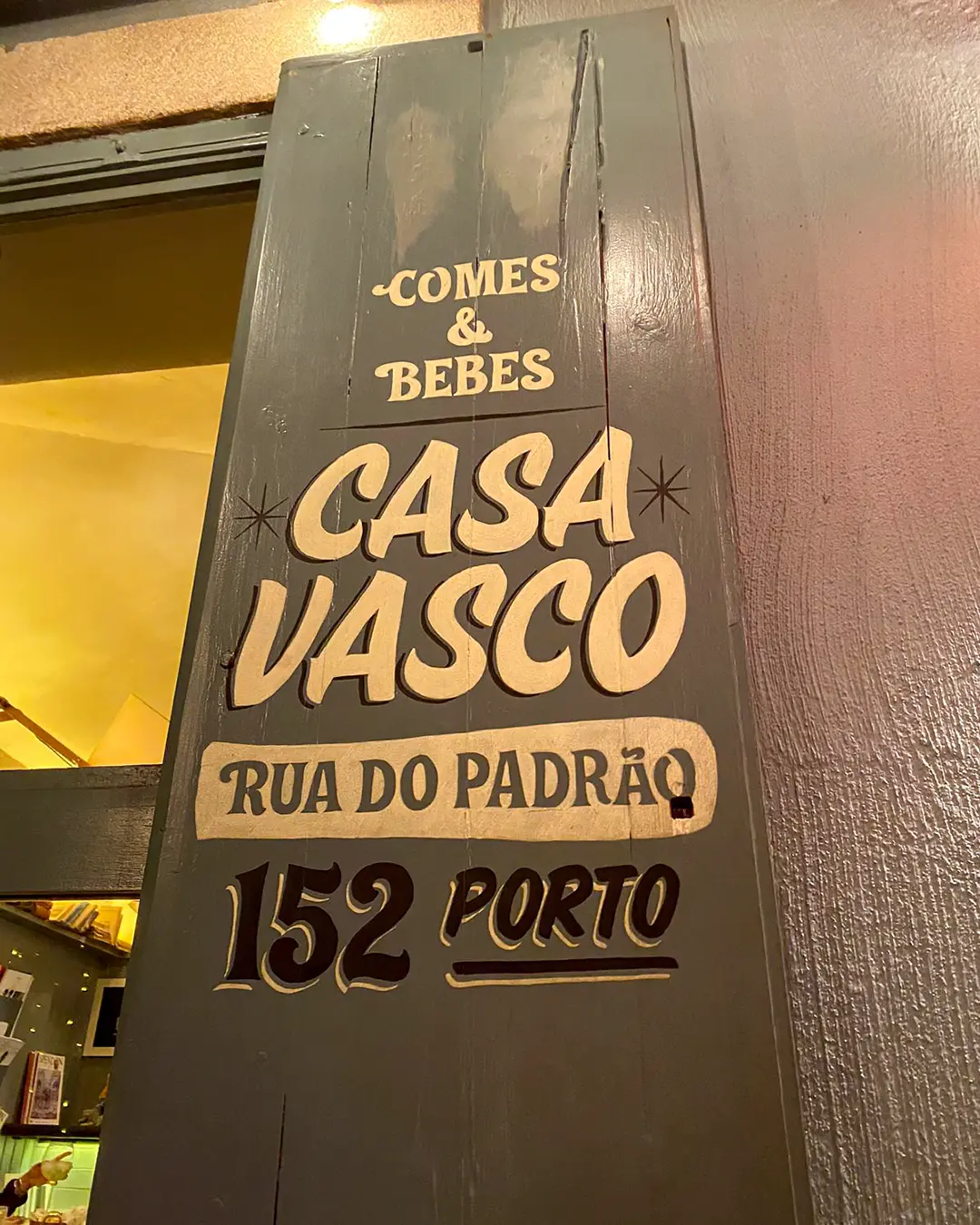 Painted wooden sign for Casa Vasco restaurant at Rua do Padrão 152 in Foz do Douro Porto