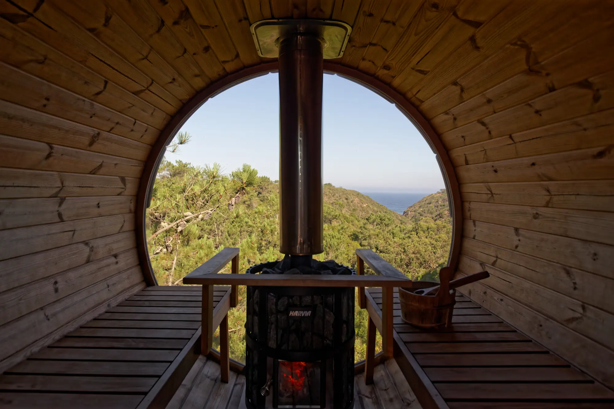 Interior of the wood-fired barrel sauna at Amaria, Costa Vicentina