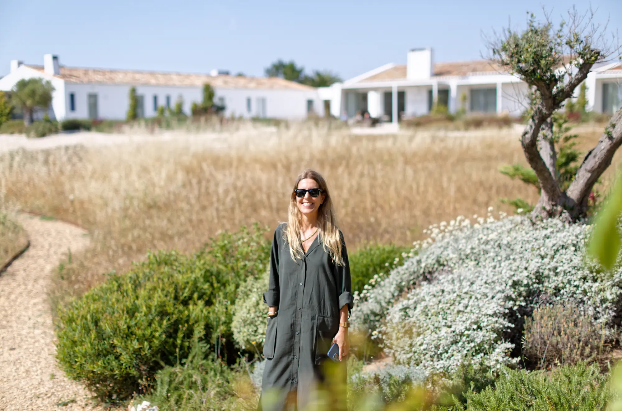 Joana from JO&SO walking through the gardens at Amaria, Costa Vicentina