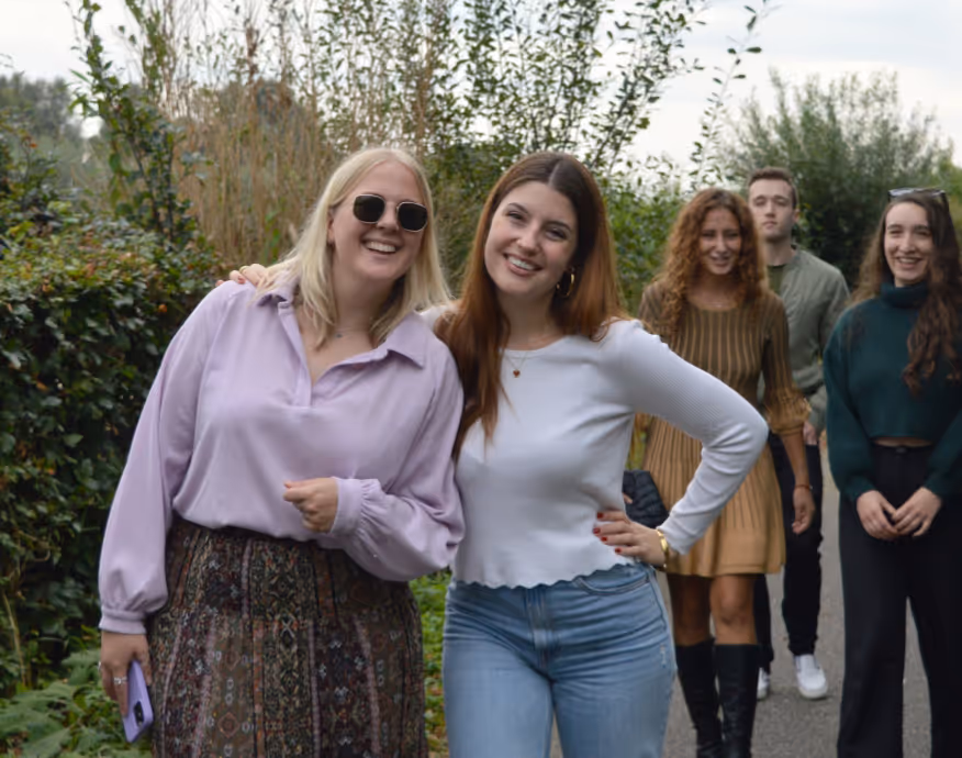 Alumio employees walking in green outdoors - Netherlands, Groningen.