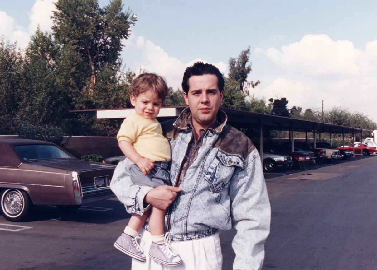 Before: an old baby photo, scanned with fading and damage