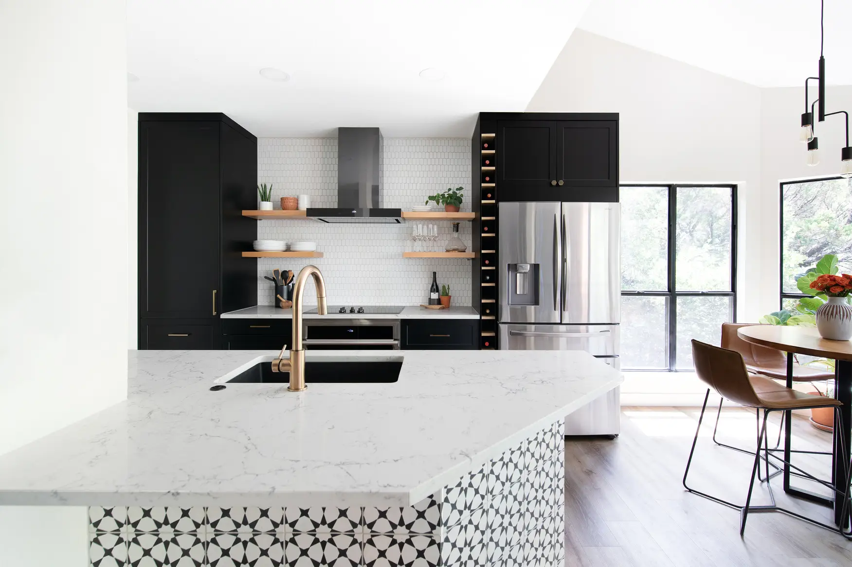 Modern Kitchen Design With Black, White, and Gold Accents
