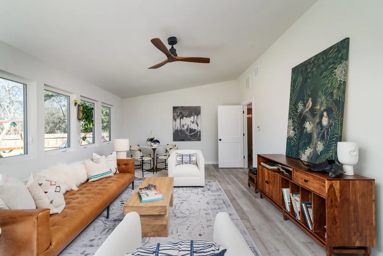 Living Room Featuring a Brown Leather Sofa