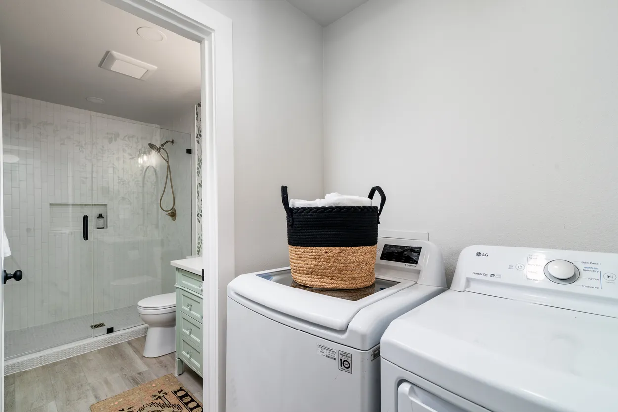 Laundry Room with White Washer and Dryer