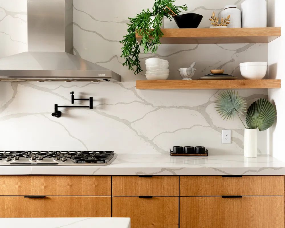 Veined Countertop, Wood Shelves, and Black Accents
