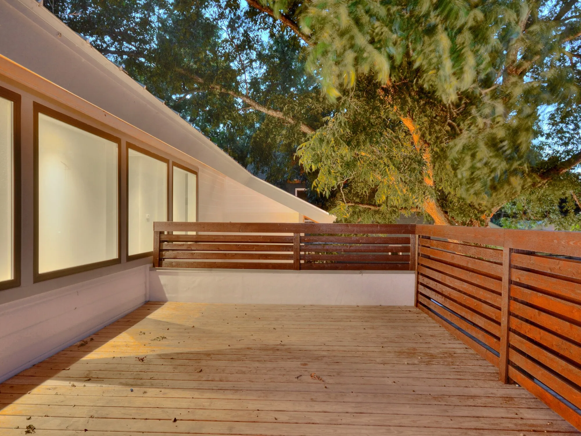 Modern Wooden Deck with Horizontal Slatted Railing