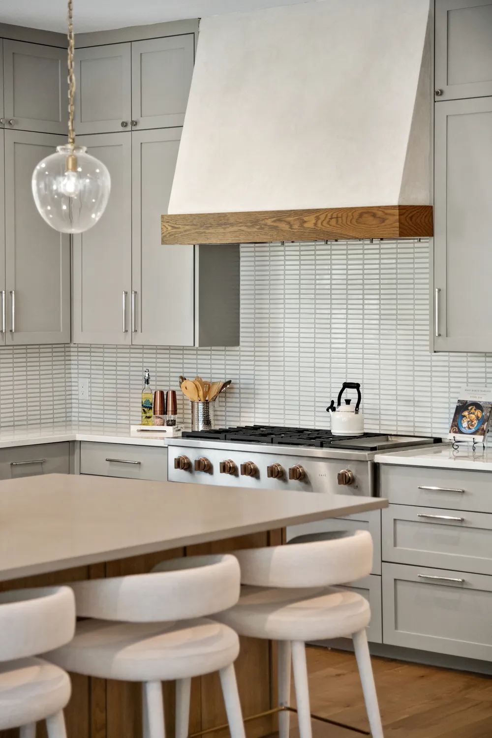 Contemporary Kitchen with Sleek Cabinets and Subway Tile Backsplash