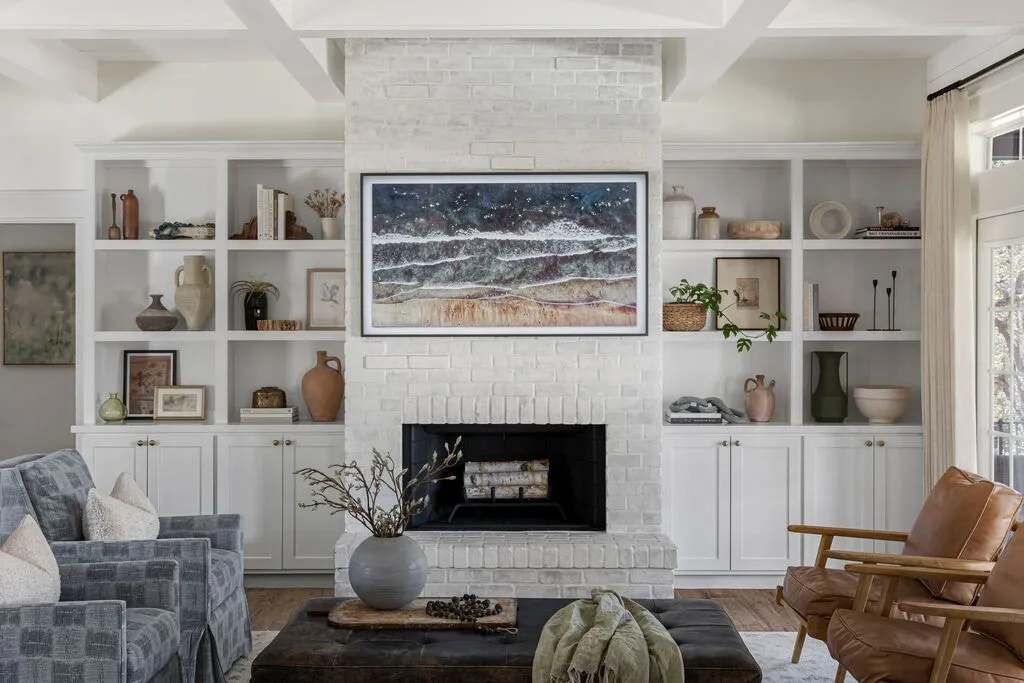 Cozy Living Room with White Brick Fireplace