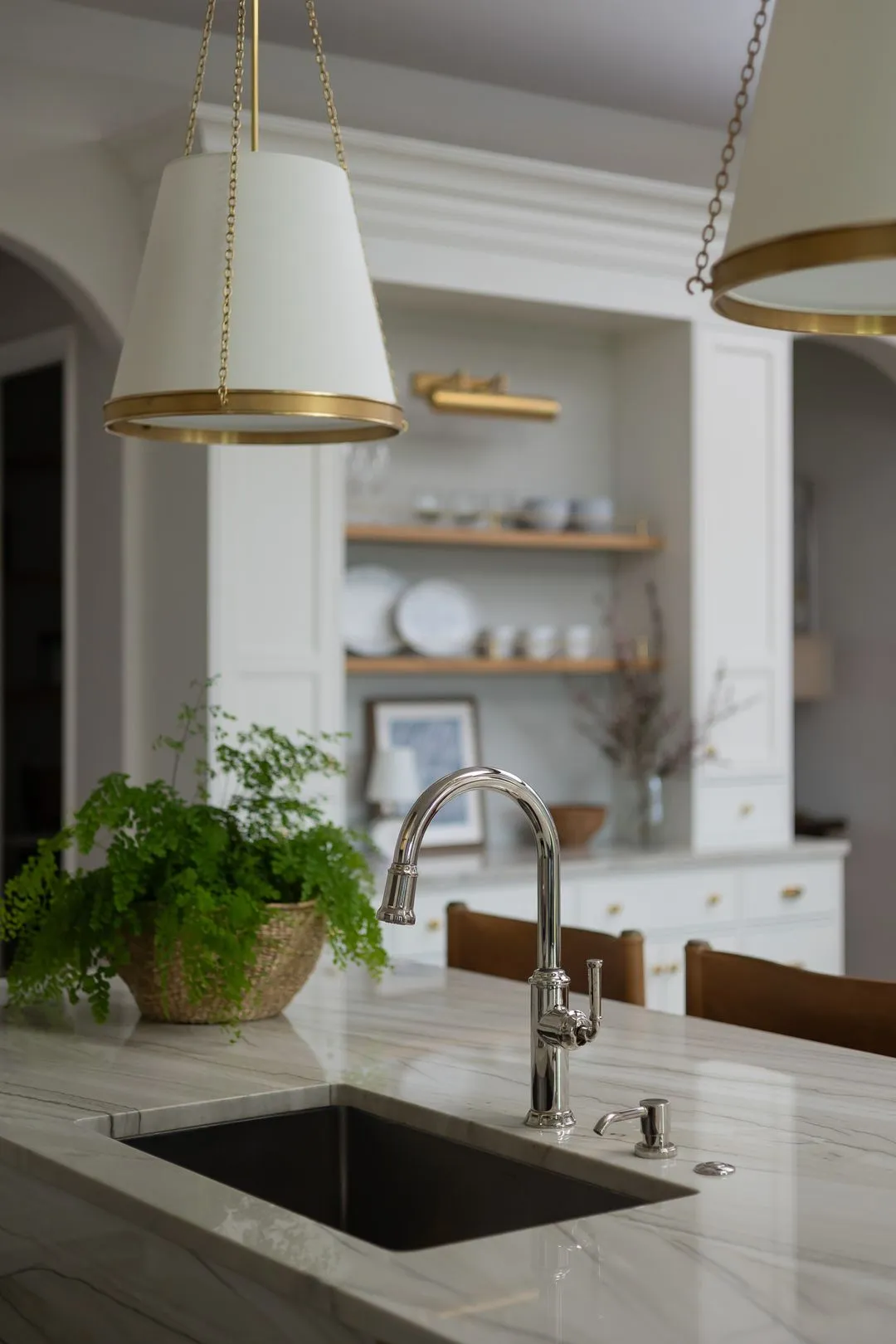 Kitchen remodeling in Austin featuring a marble sink and chrome faucet.