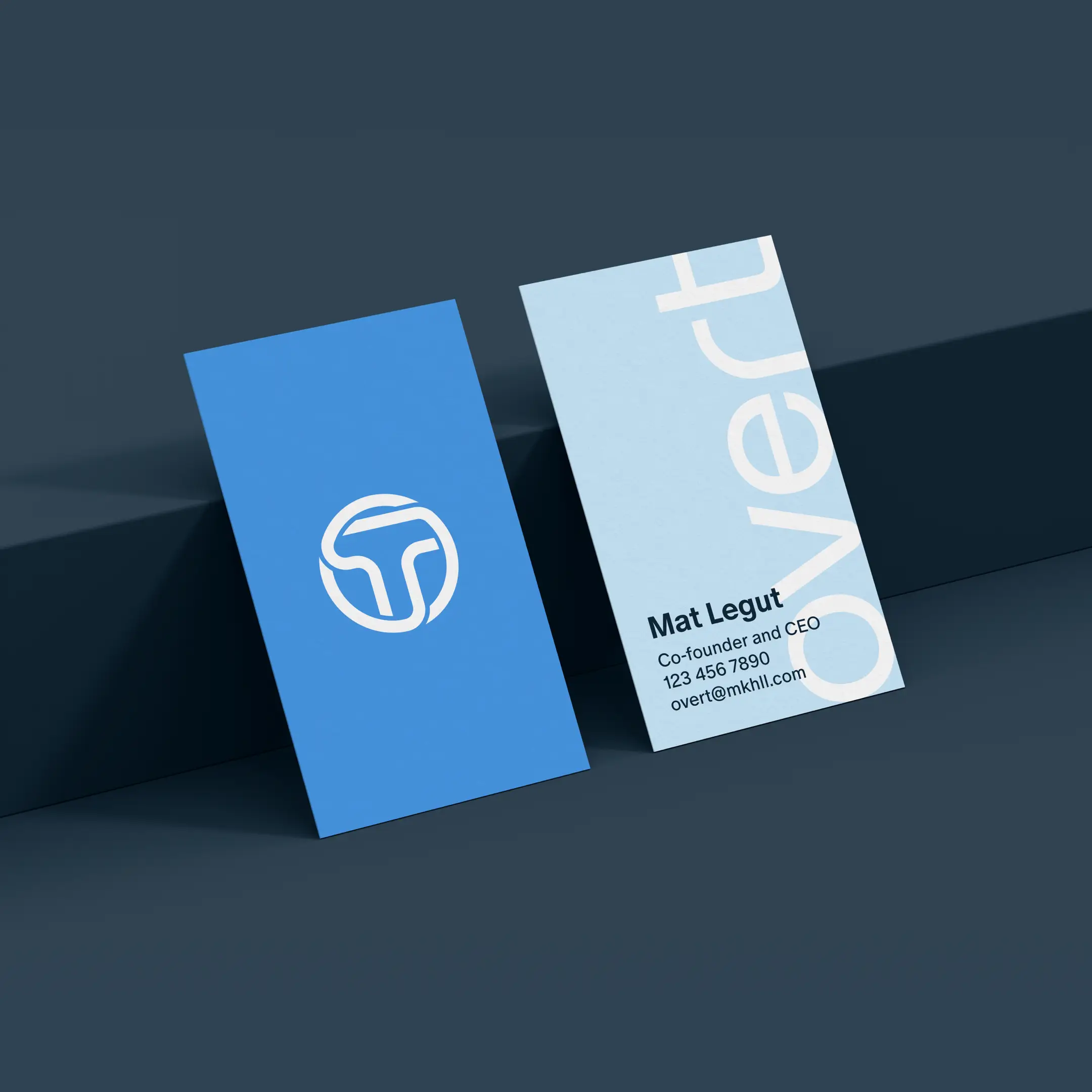A mockup of the Overt brand applied to business cards