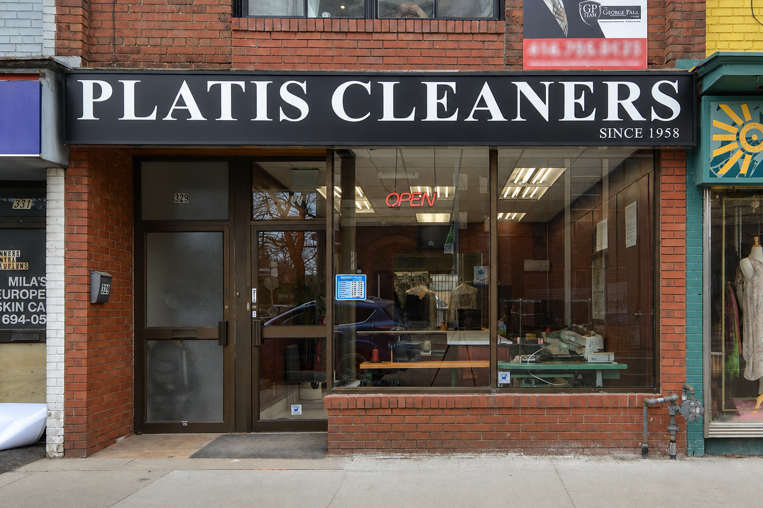 Platis Cleaners storefront with black exterior signage