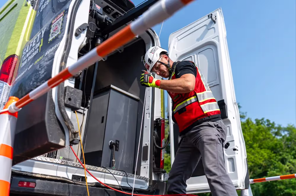 A GPRS PM deploys a CCTV Rover camera from the winch in the back of his work truck as part of a video pipe inspection
