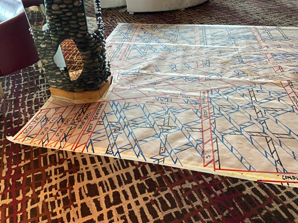 Concrete scanning mark-outs on floor protection in a resort.