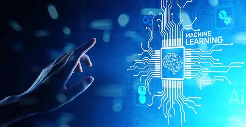 A hand reaching toward a digital interface displaying the words 'MACHINE LEARNING', with a circuit board design and brain icon symbolizing AI technology.