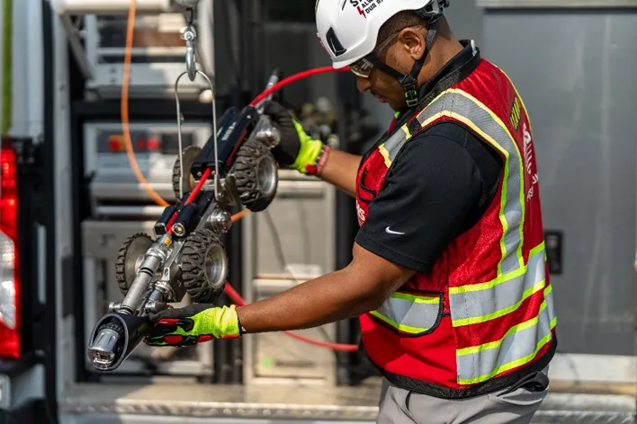 A GPRS Project Manager preparing to use a CCTV crawler to investigate underground pipes.