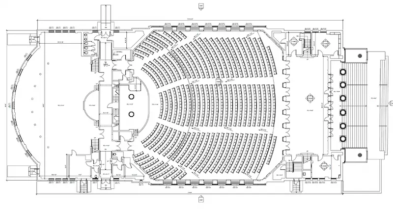 A detailed architectural floor plan of a large auditorium. The layout includes a semi-circular seating arrangement with multiple rows of seats facing a stage area.