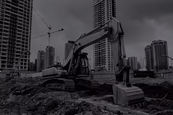 A large construction machine is sitting in a dirt pile. - GPRS