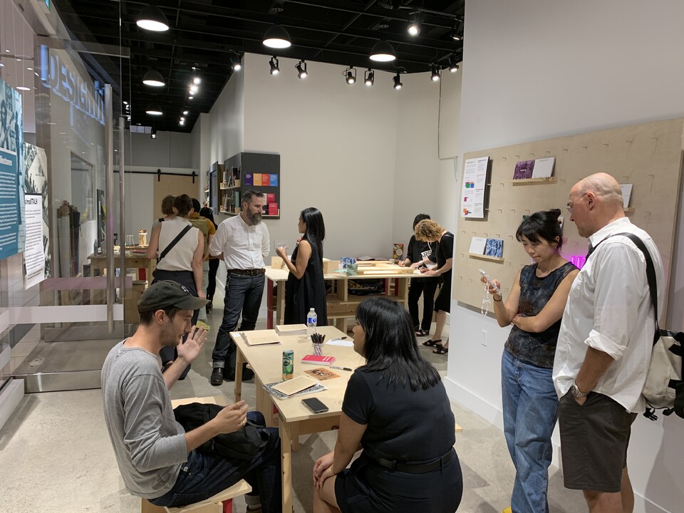 people in the smalltalk exhibition space.