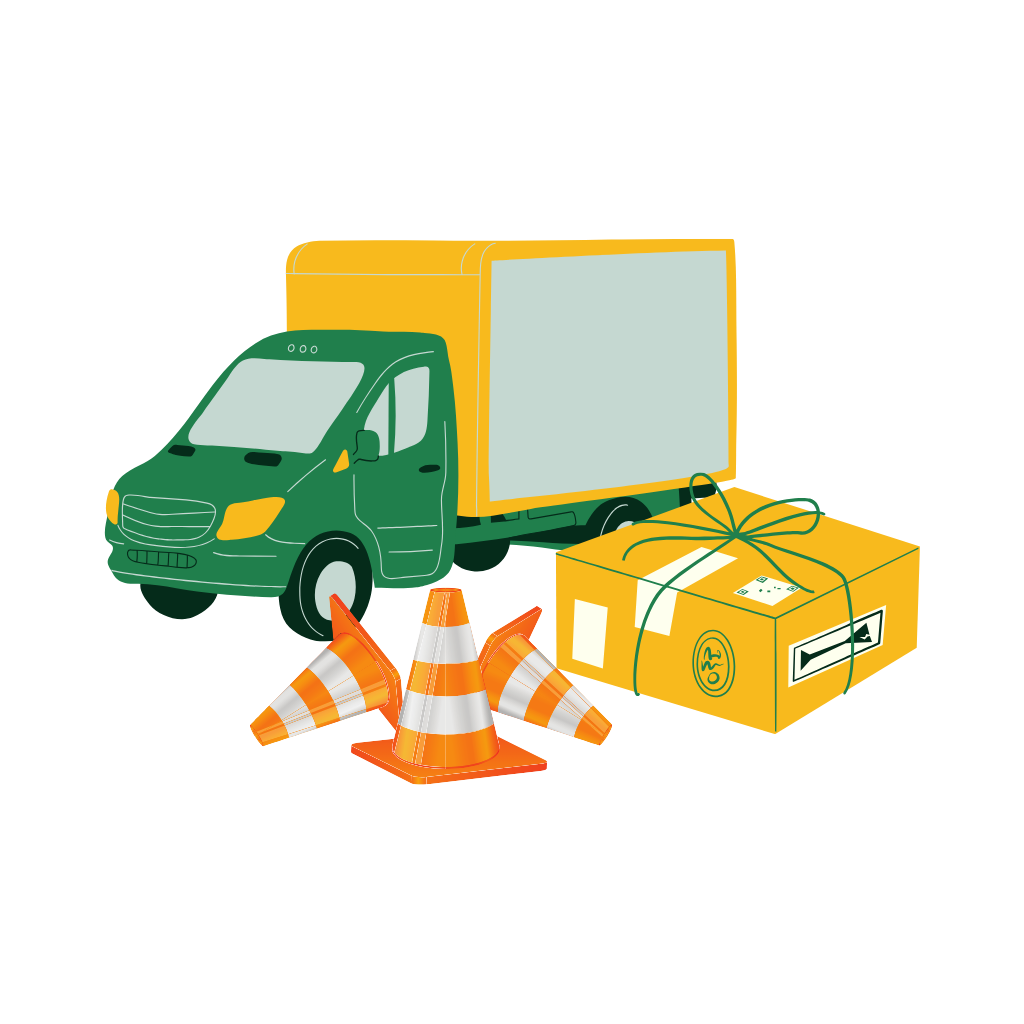 A truck parked next to a box filled with traffic cones and another box nearby.