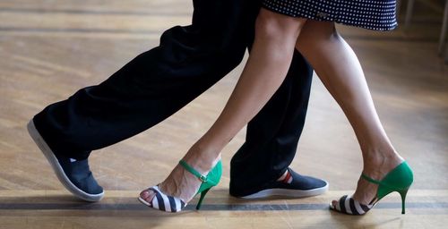 Feet of a couple dancing tango