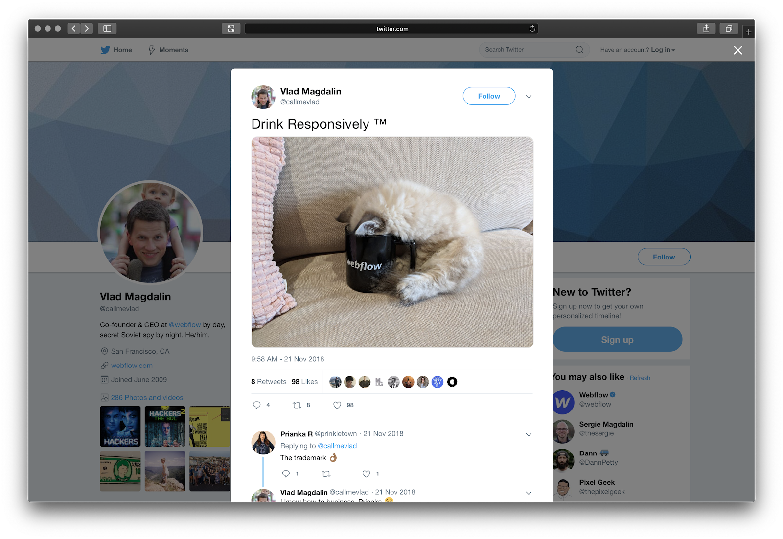 Tweet by Vlad Magdalin with a picture of a kitten with its head in a Webflow branded mug and a caption that says, "Drink Responsively"