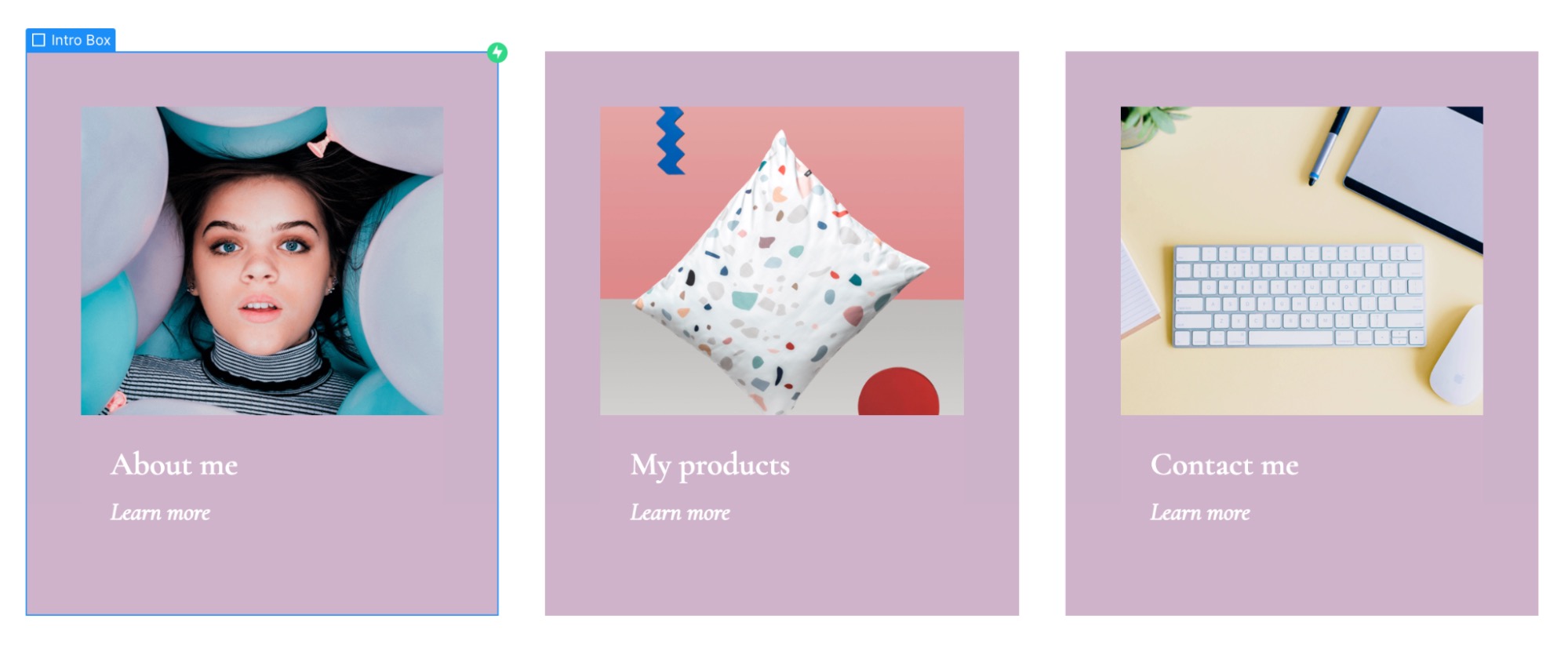 A cushion designer's website displaying intro text, a "learn more" button, and three clickable intro boxes: about me, my products, and contact me. In this version, there is more padding around each image in the intro box and the intro box text appears directly below the image instead of closer to the edge of the intro box.
