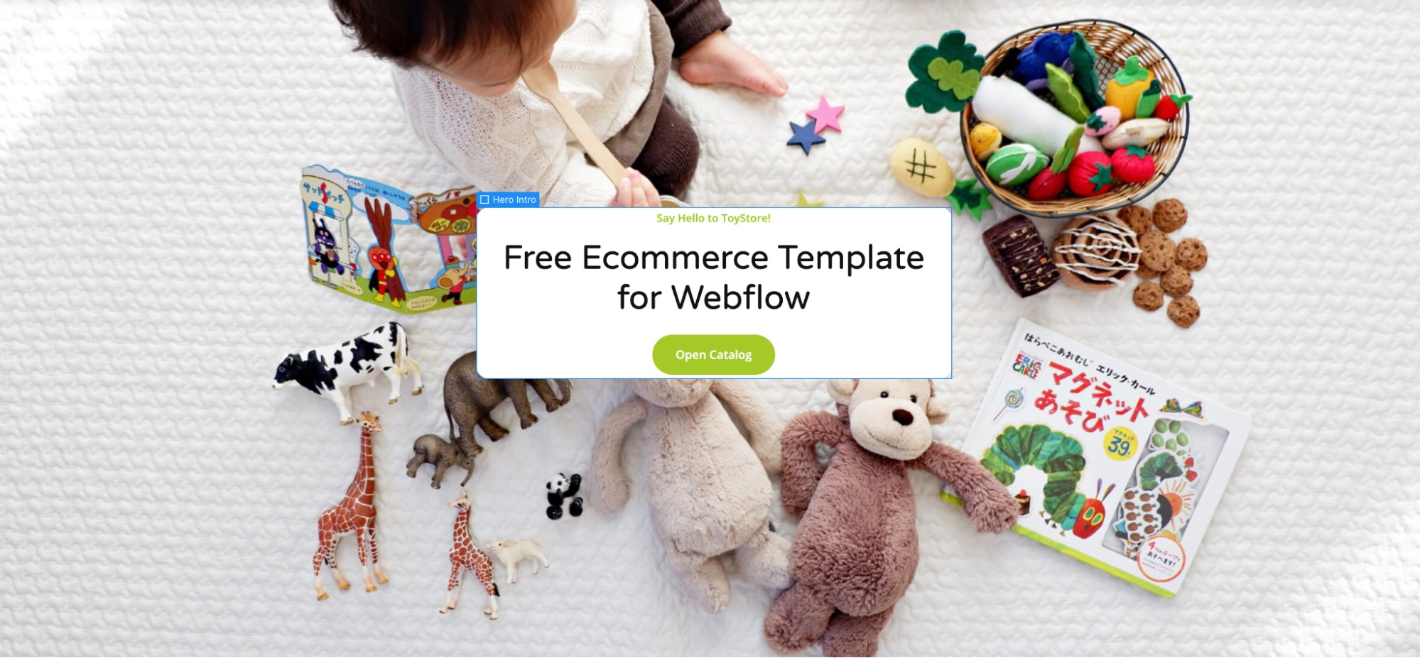 A hero intro div block on the ToyStore website. It reads: "Say Hello to ToyStore!" followed by "Free Ecommerce Template for Webflow." Below this text, there is a green call-to-action button that says "Open Catalog." The div block is surrounded by minimal white padding.