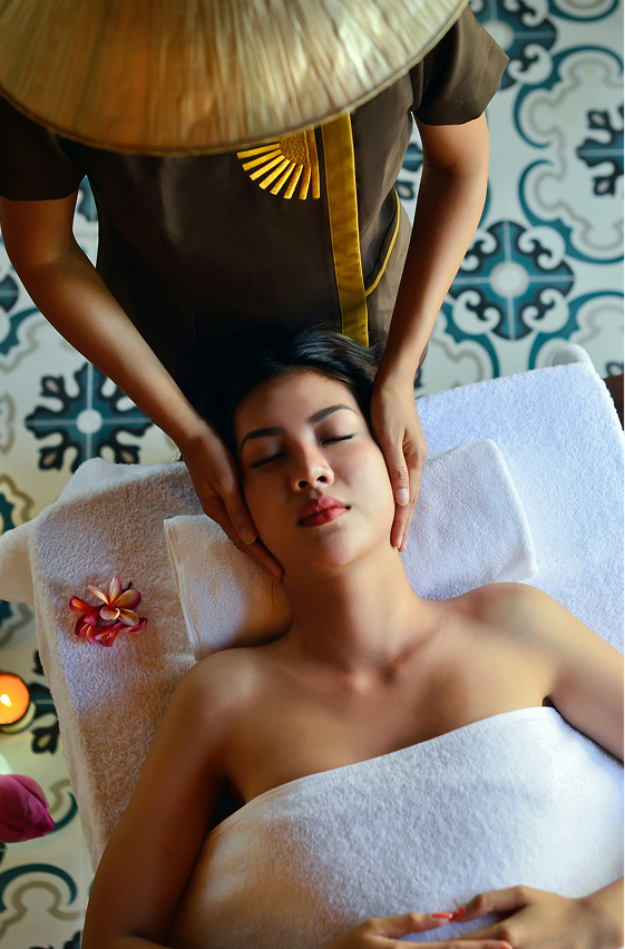 Healthcare professional holding a digital shield with a medical cross, representing secure, modern healthcare marketing services and digital solutions by Veewz.