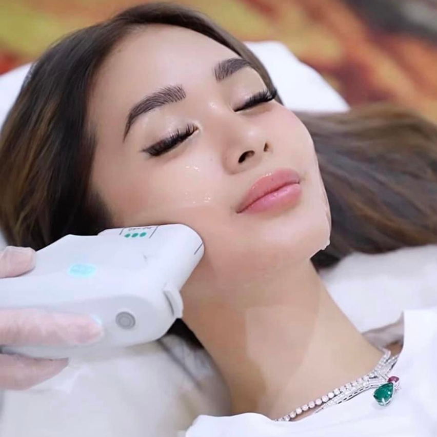 Healthcare professional holding a digital shield with a medical cross, representing secure, modern healthcare marketing services and digital solutions by Veewz.