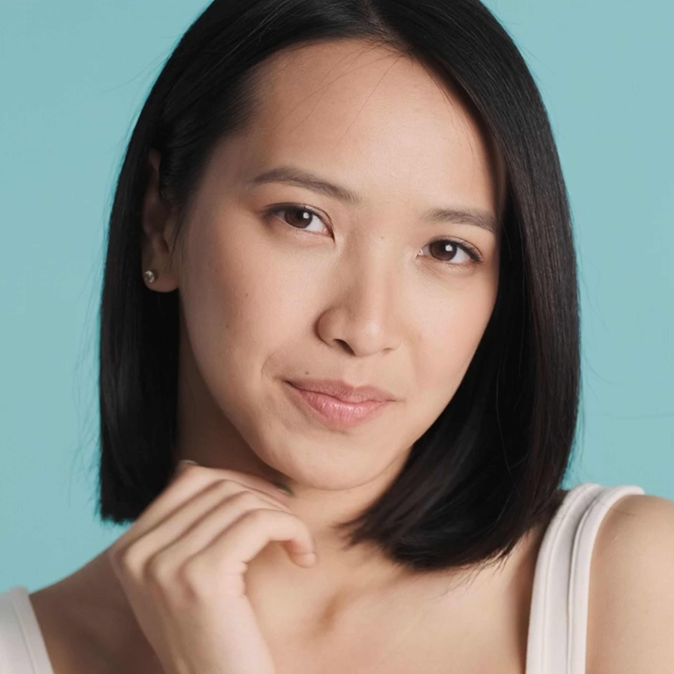 Healthcare professional holding a digital shield with a medical cross, representing secure, modern healthcare marketing services and digital solutions by Veewz.