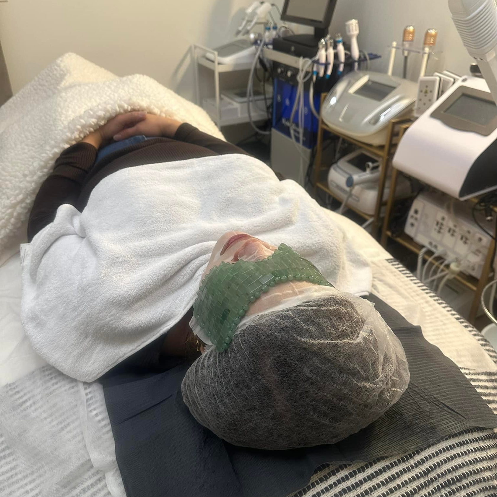 Healthcare professional holding a digital shield with a medical cross, representing secure, modern healthcare marketing services and digital solutions by Veewz.