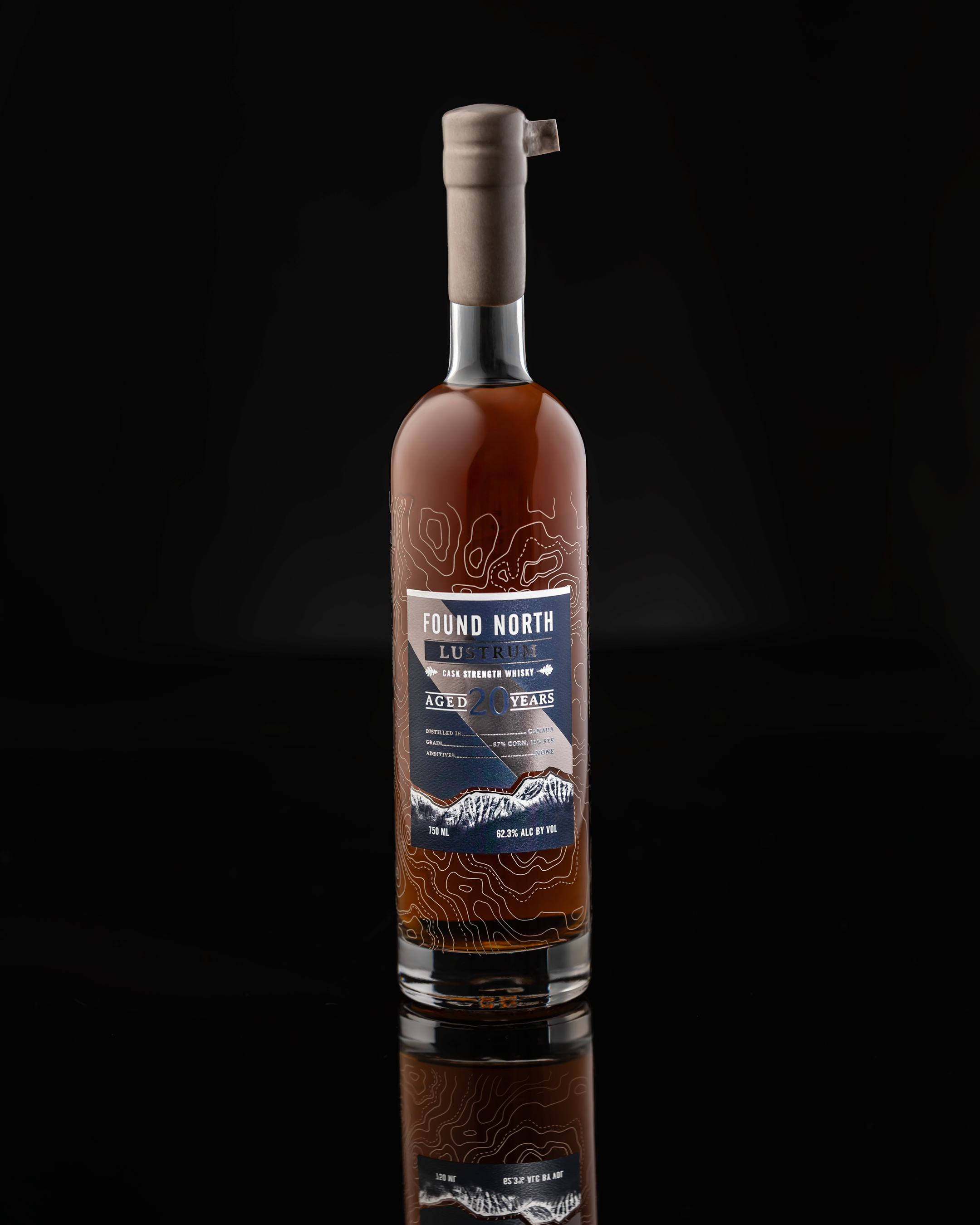 Thumbnail image of Batch 001 Cask Strength Rye Whisky in front of a shed