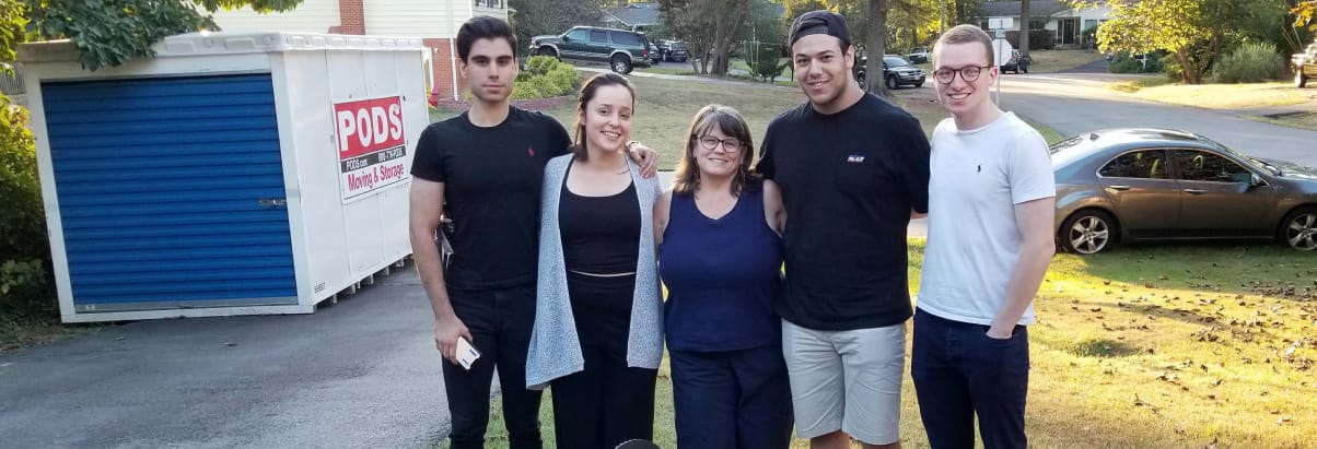 A group of students standing with their challenger