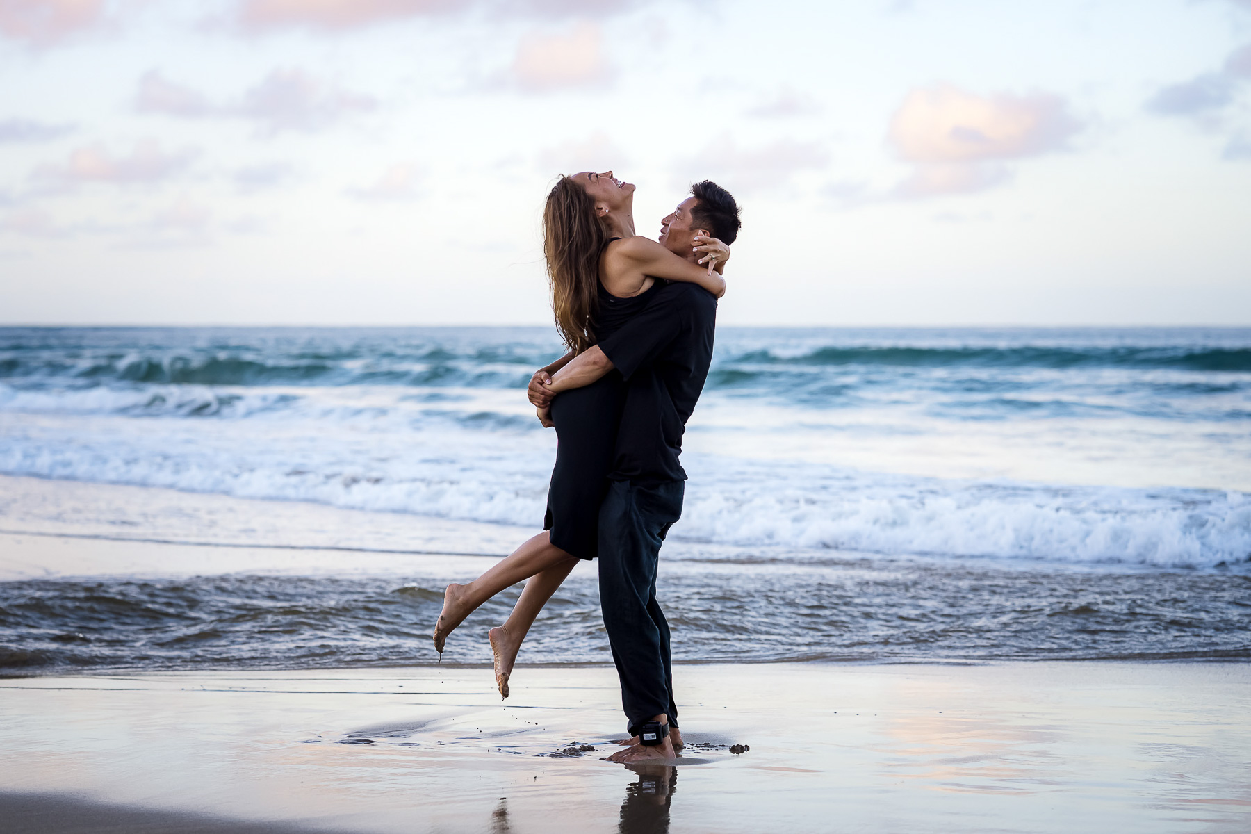 Man picks up and then spins around his fiancee