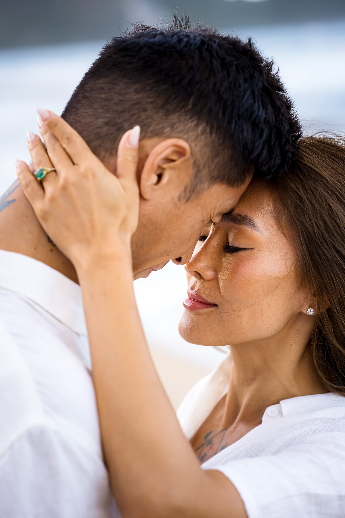 Newly engaged couple sharing an intimate moment