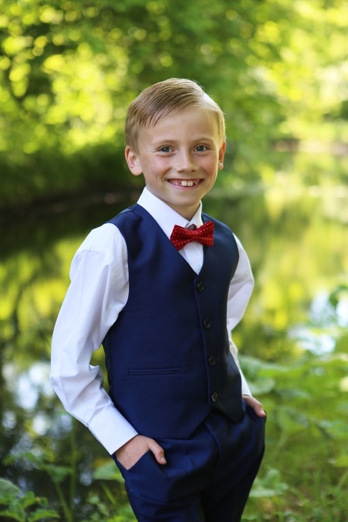 Communion boy by Jenny Callanan Photography