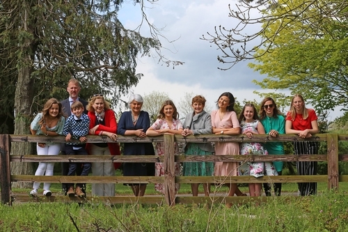 Confirmation girl with her family by Jenny Callanan Photography