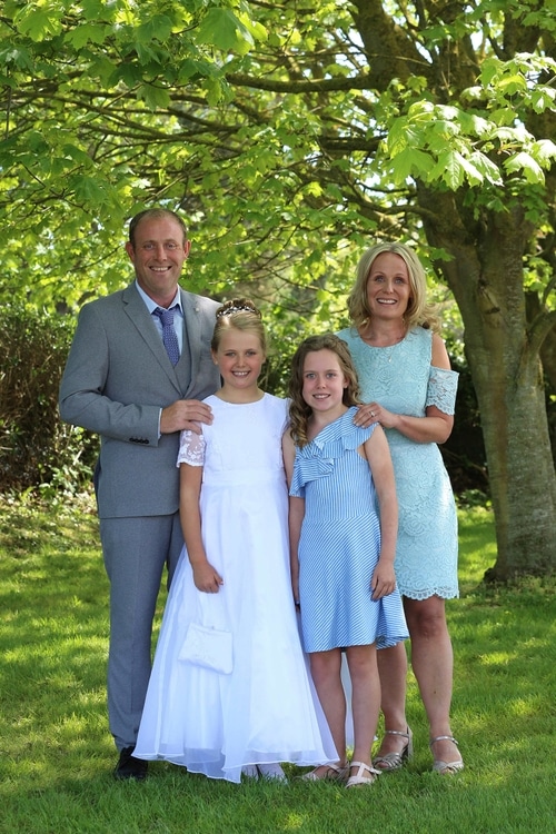 Communion girl with her family by Jenny Callanan Photography