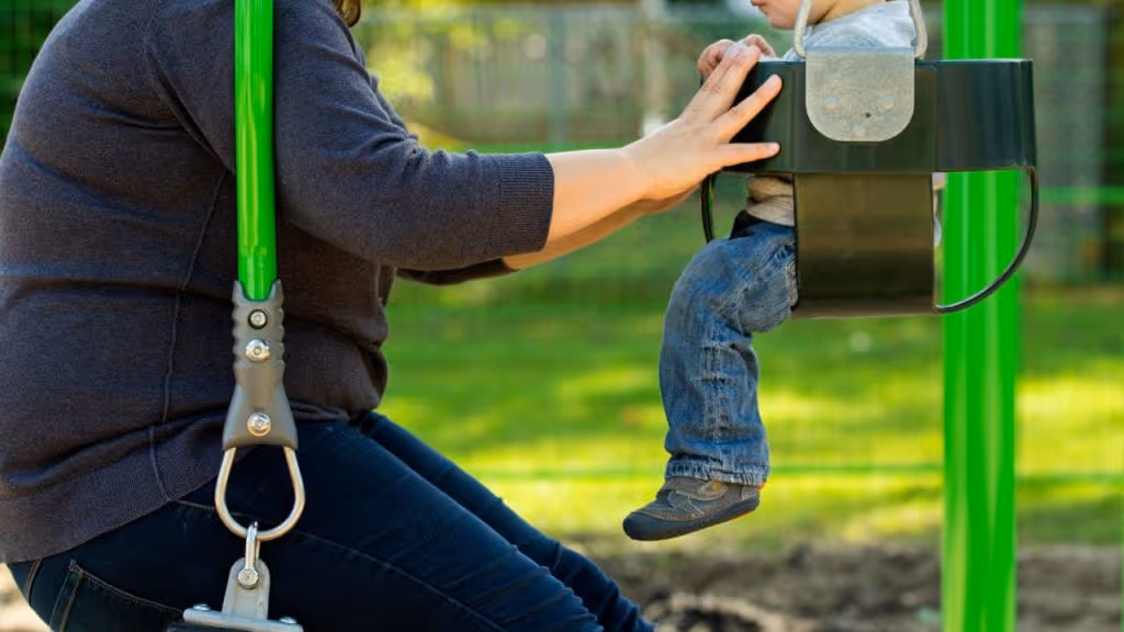 a father holding his son 