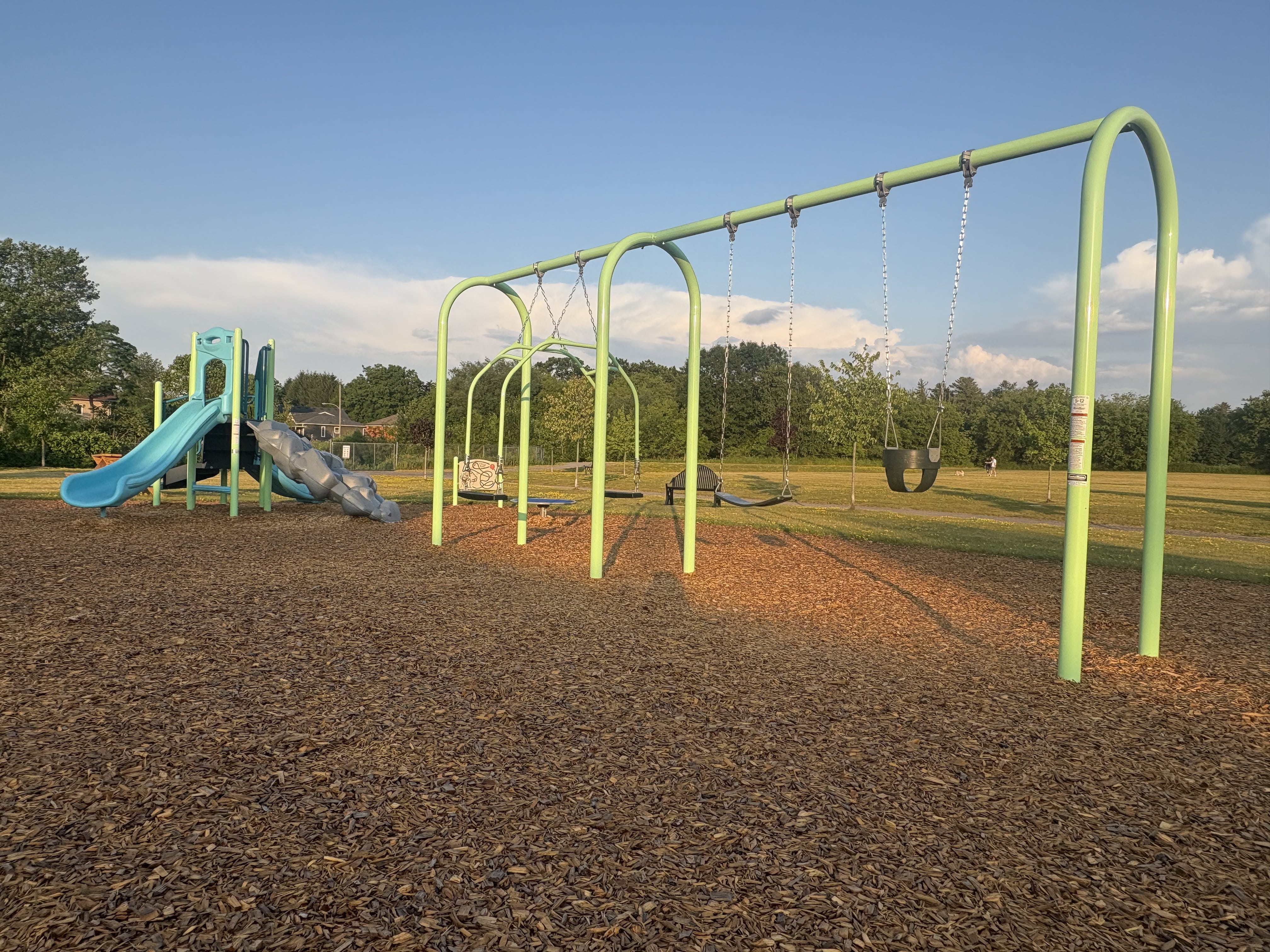 Rapley Park playground equipment in Port Hope, ON with safety surfacing and equipment