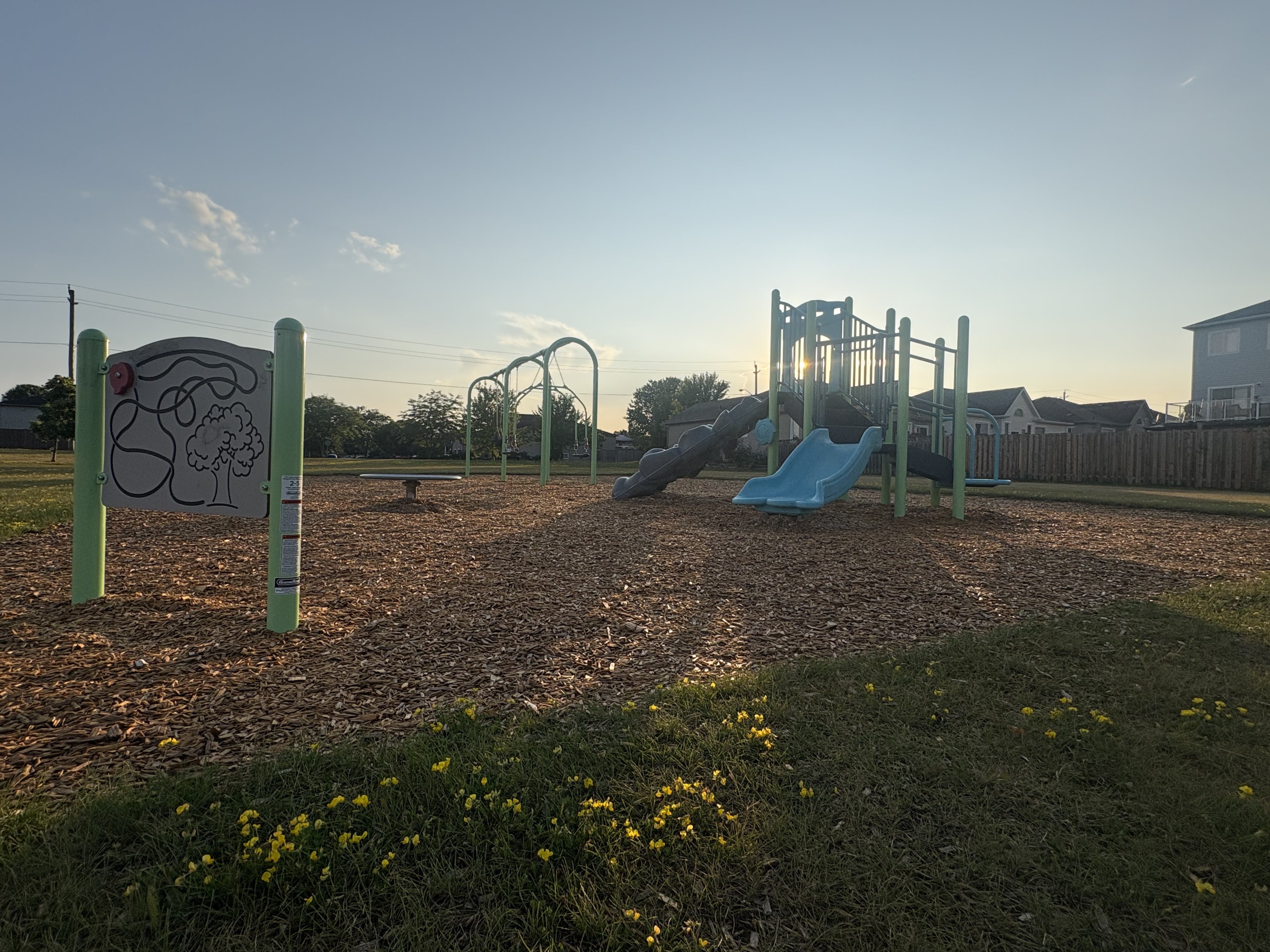 Rapley Park playground equipment in Port Hope, ON featuring colorful play structures