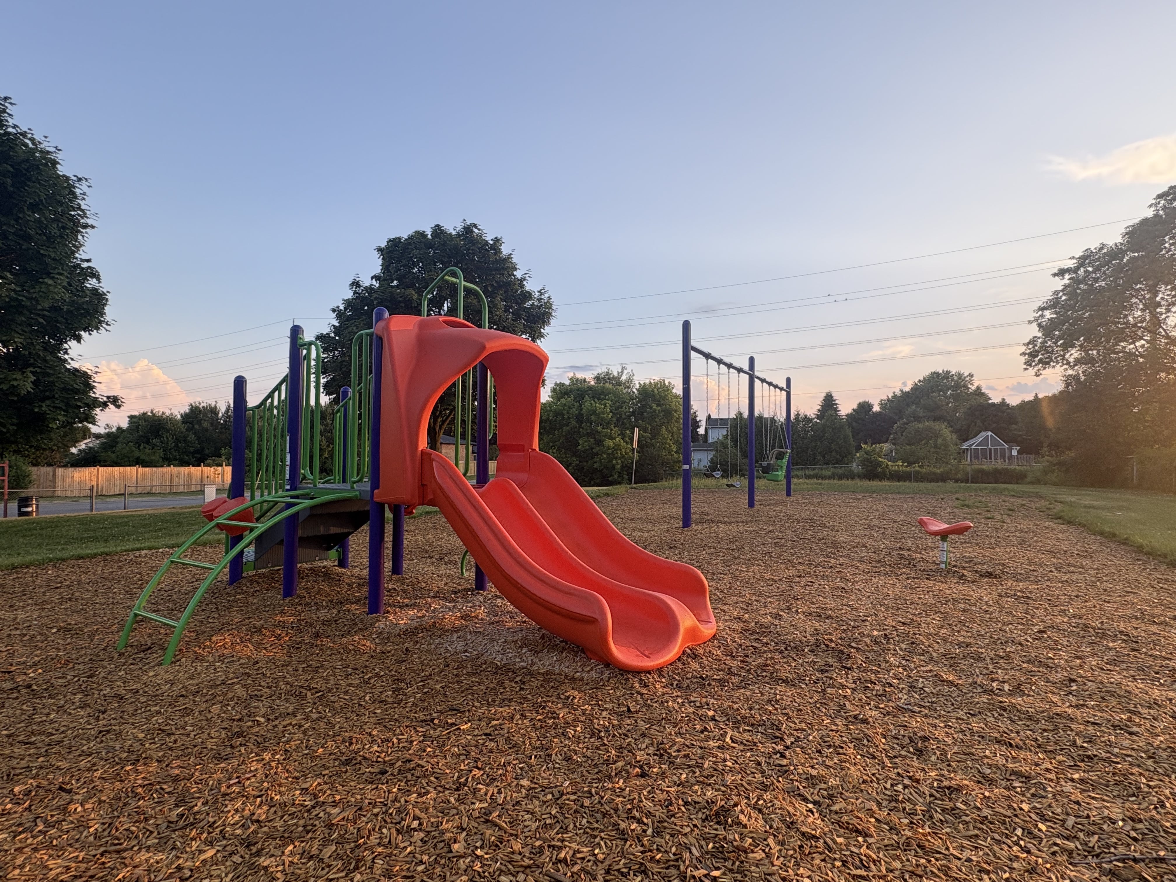 Hewson Park playground equipment in Port Hope, ON showing community playground space