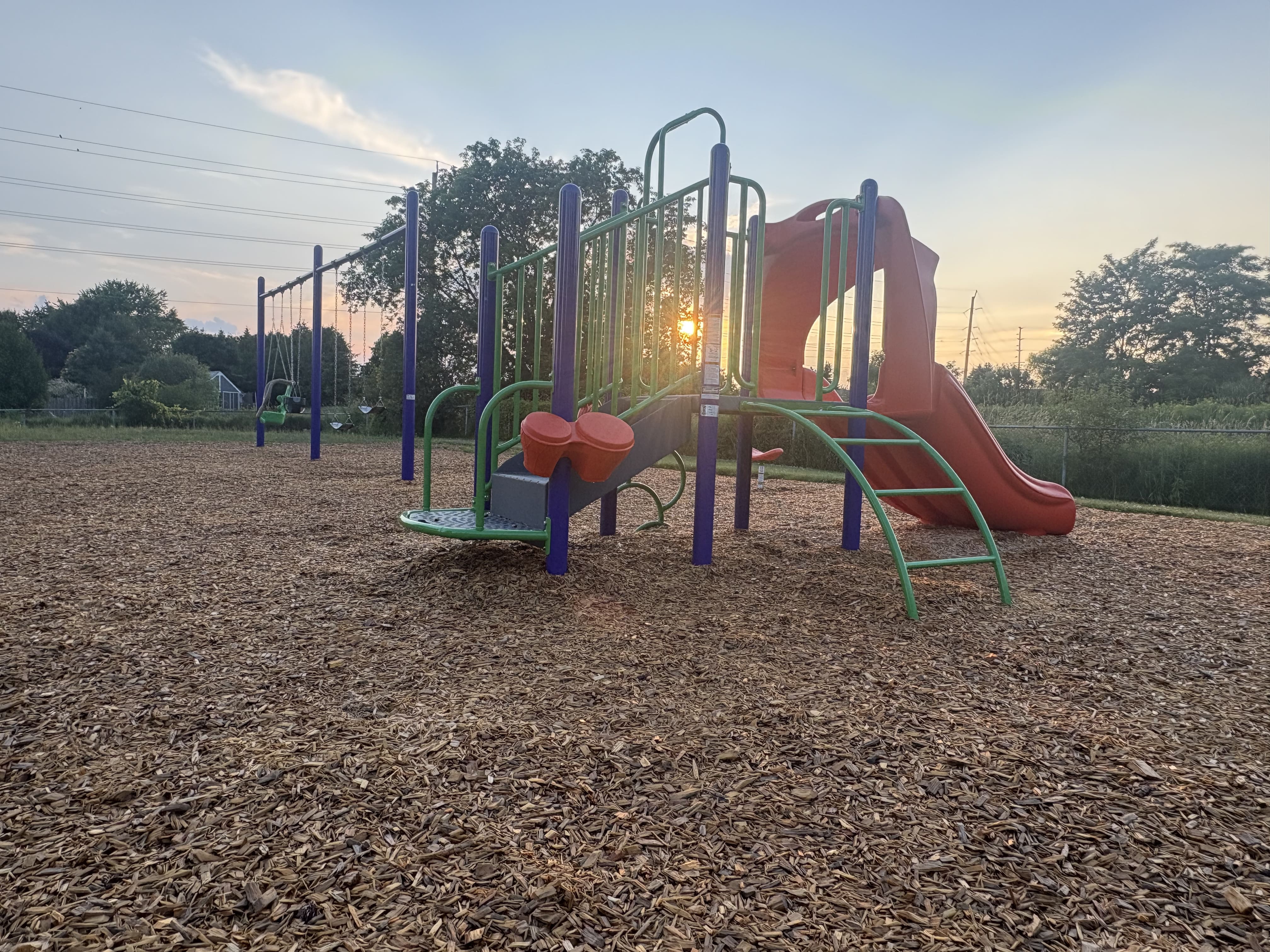 Hewson Park playground equipment in Port Hope, ON with safety surfacing and equipment