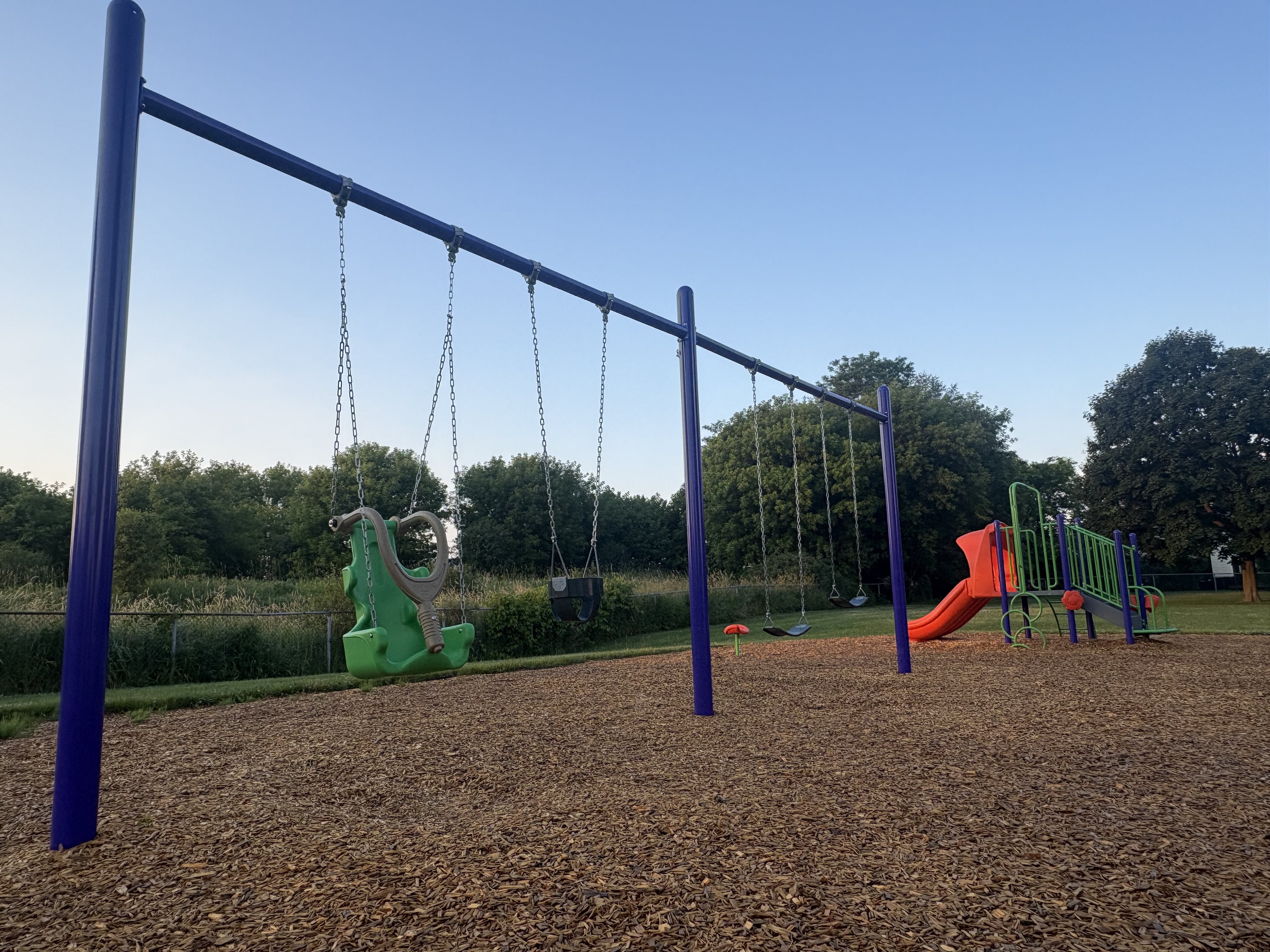 Hewson Park playground equipment in Port Hope, ON with inclusive play features