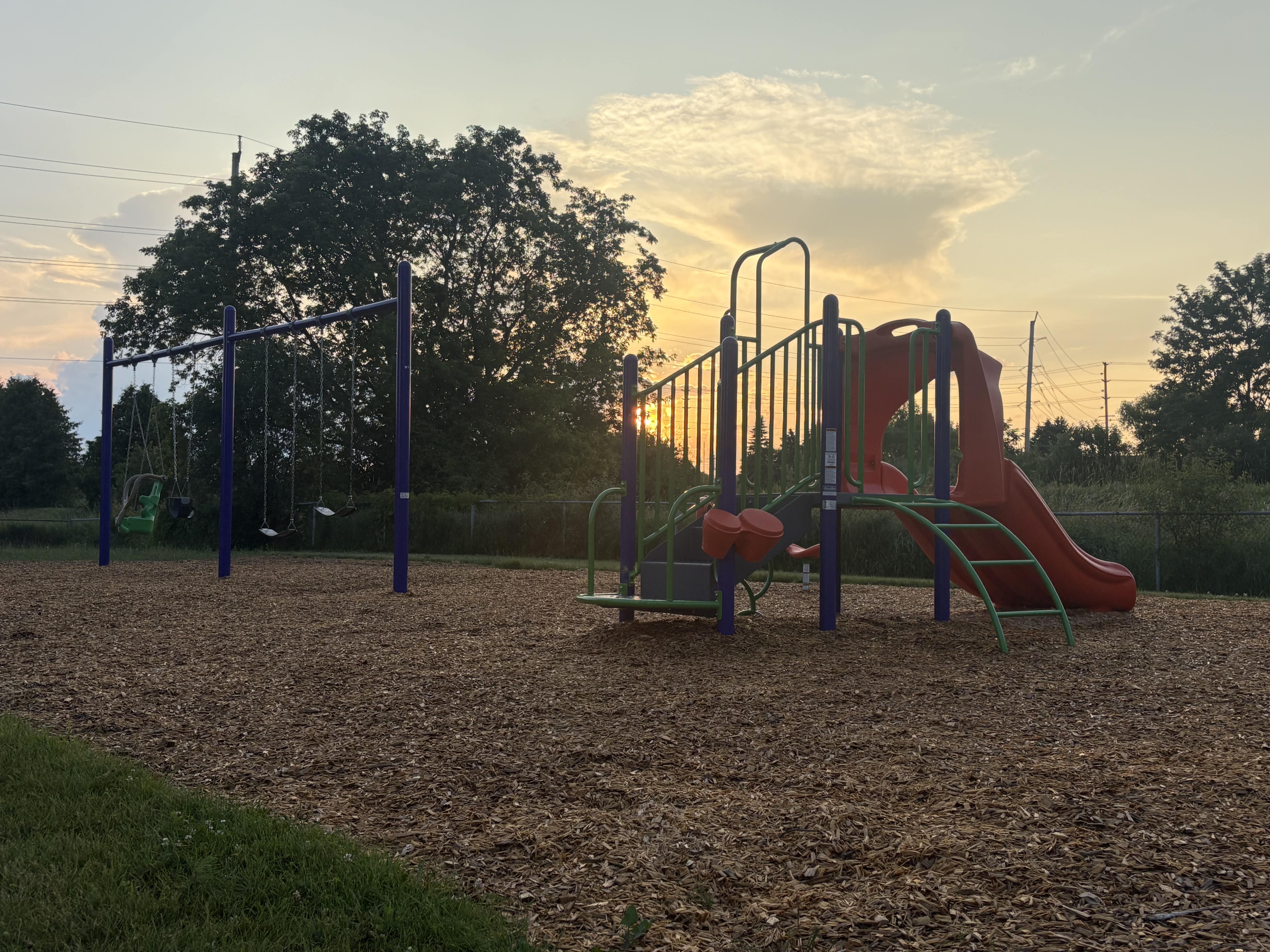 Hewson Park playground equipment in Port Hope, ON with Zip Swerve Slide equipment