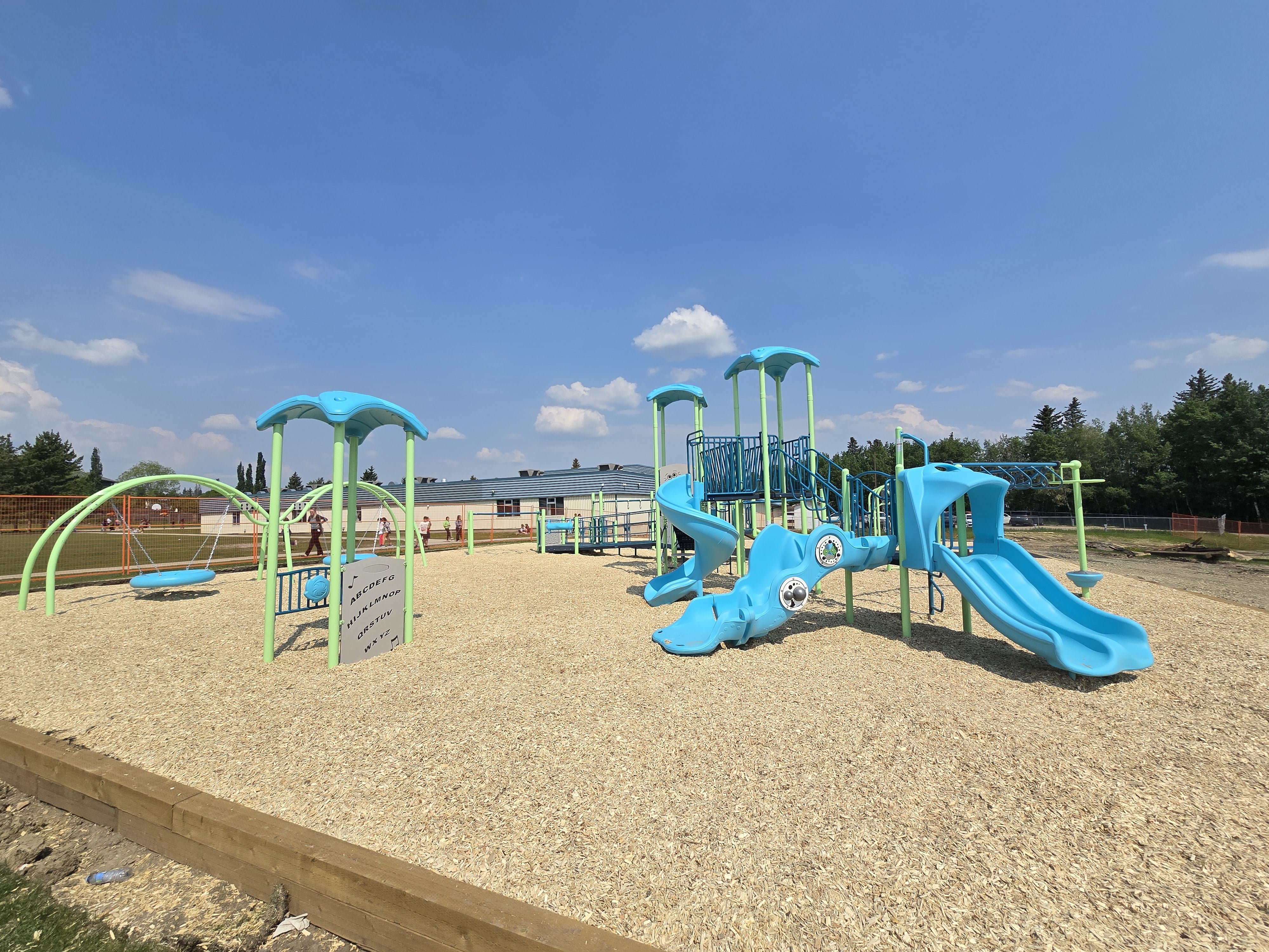 Steffie Woima Elementary School playground in Sylvan Lake, AB with school playground
