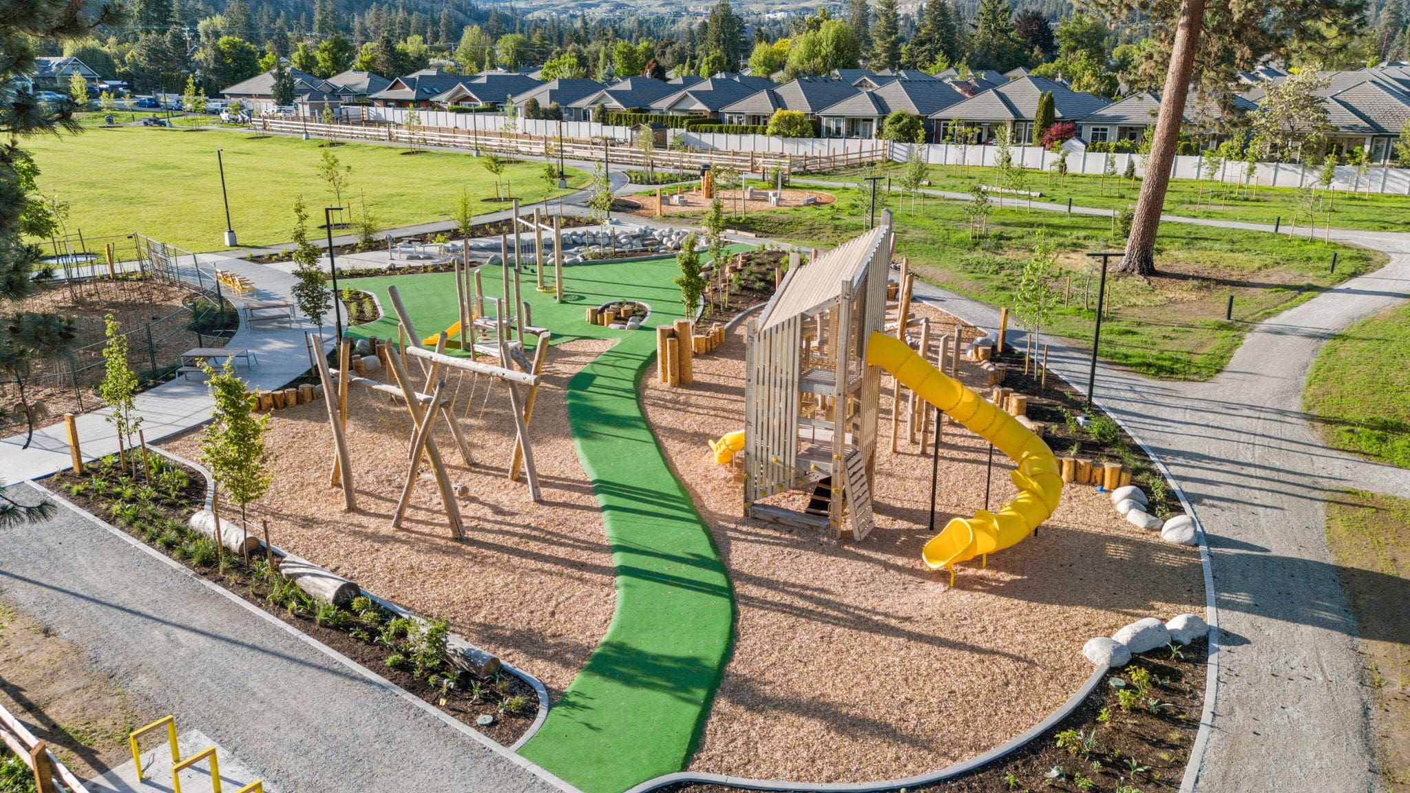 DeHart Community Park in Kelowna, BC featuring playground equipment with community playground