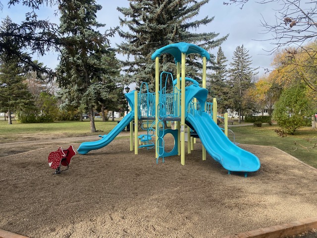 Coronation Park playground equipment in Brandon, MB with safety surfacing and equipment