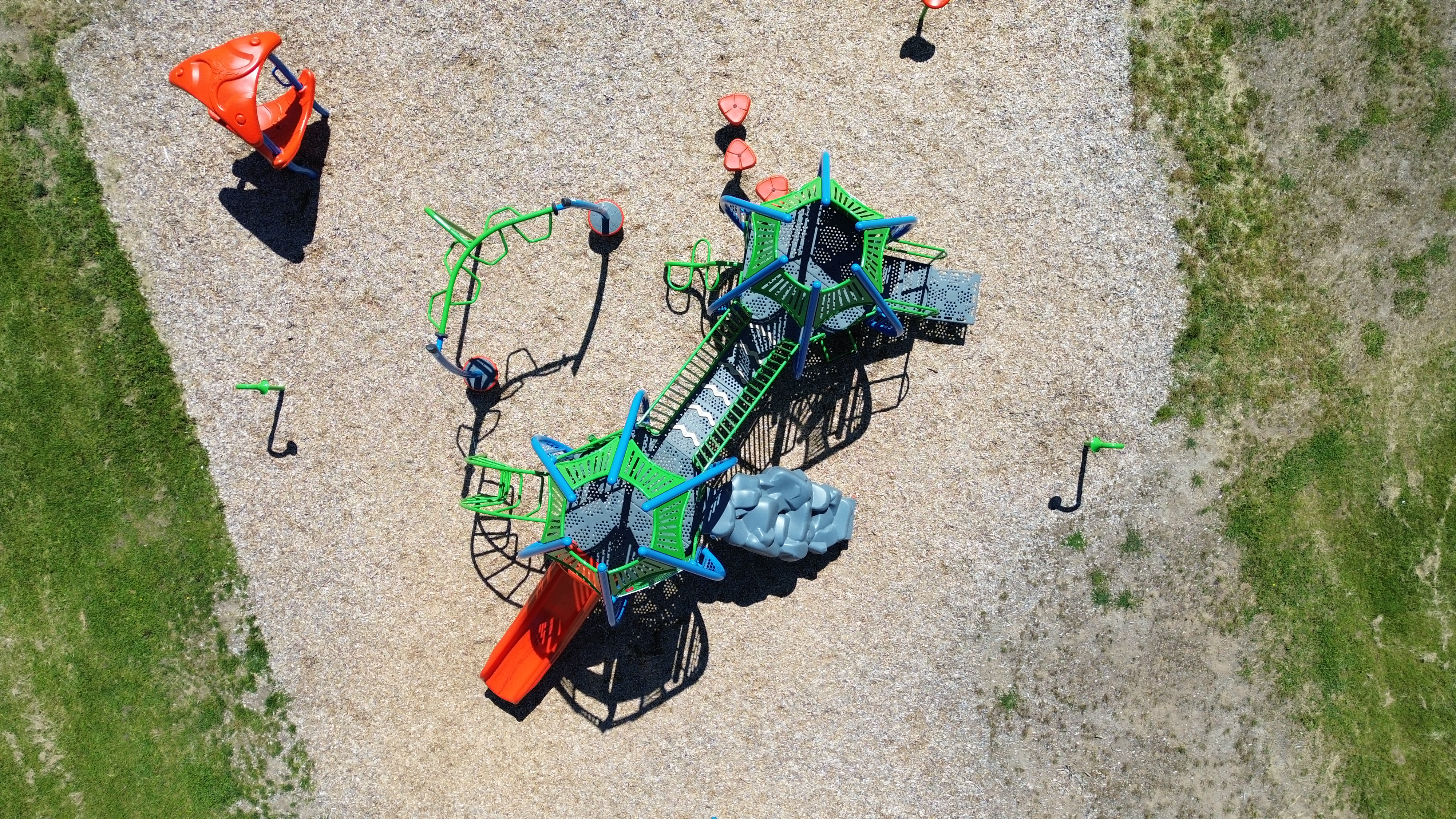 Newton Park playground equipment in Sarnia, ON featuring zipline and adventure equipment