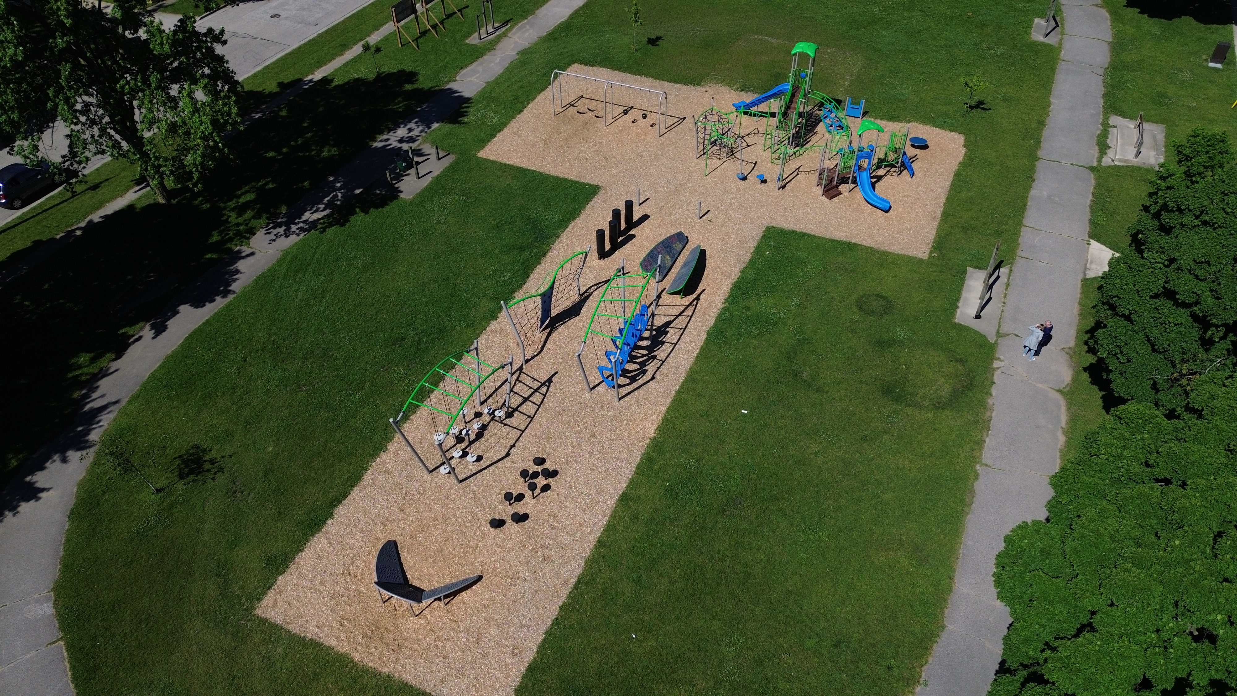 Harry Turnbull Park playground equipment in Sarnia, ON showing swing sets and climbing areas